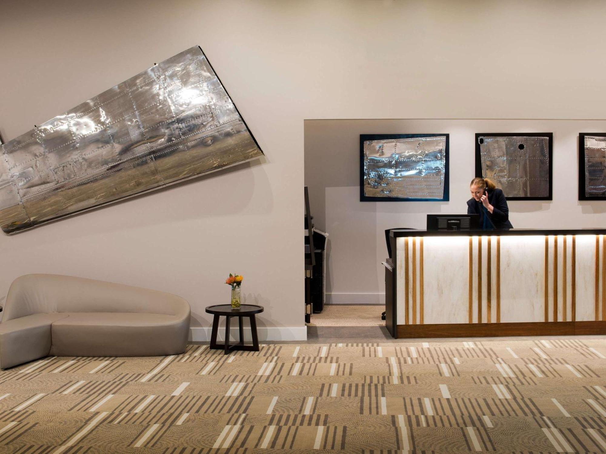 Hotel Pullman Brisbane Airport Exteriér fotografie The reception area at the hotel