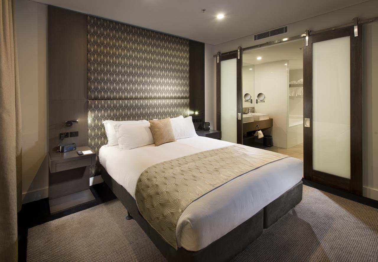 Hotel Pullman Brisbane Airport Exteriér fotografie A bedroom at the hotel