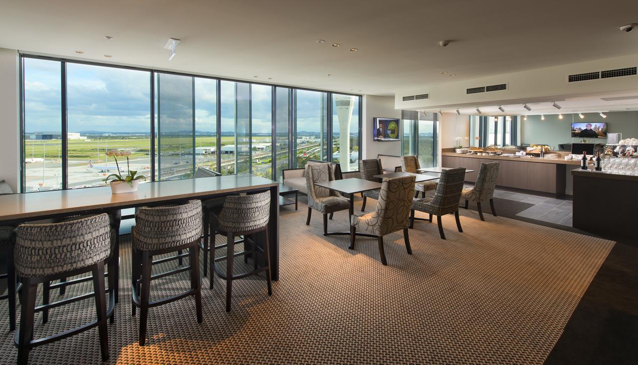 Hotel Pullman Brisbane Airport Exteriér fotografie The lounge at Changi Airport