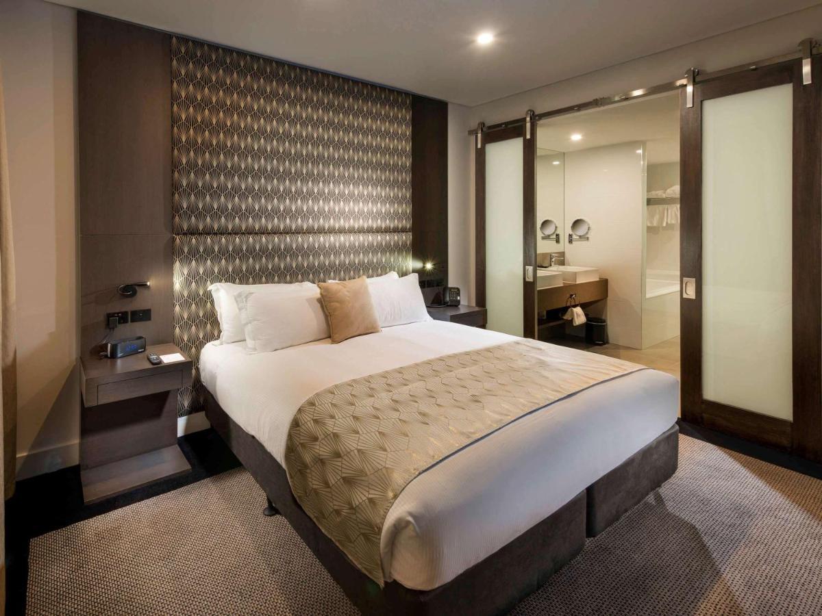 Hotel Pullman Brisbane Airport Exteriér fotografie A bedroom at the hotel
